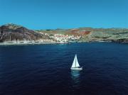 Sailboat gliding across the calm Caribbean waters at Playa Esmeralda.