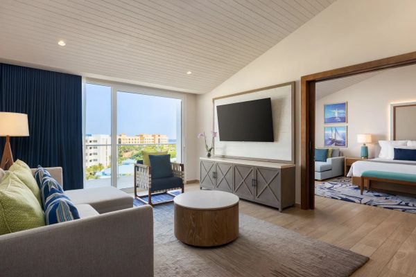 Sala de estar de la Preferred Club Master Suite Ocean View en Dreams Playa Esmeralda Resort & Spa